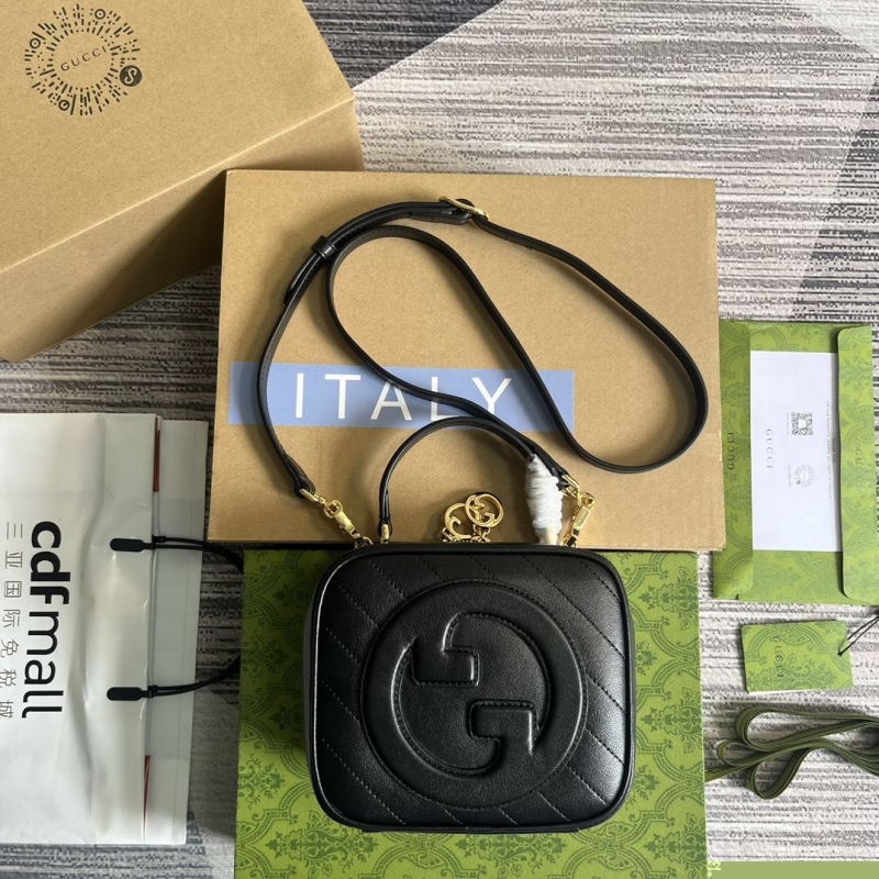 G*u*i top handle bags